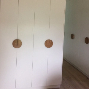 Half round handles on cupboard doors