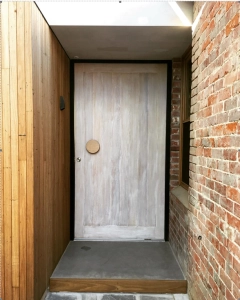 Large Round door handle on limed entry door