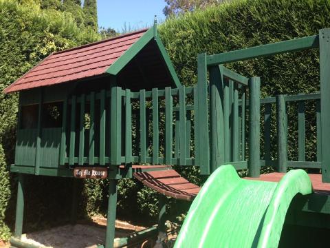 Playhouse with turned gable finial